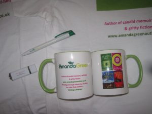 Amanda Green mugs, pens and flash drives